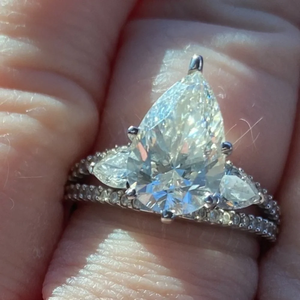 14 karat white gold lab diamond ring.